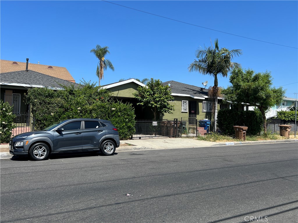 a view of a car in front of a house