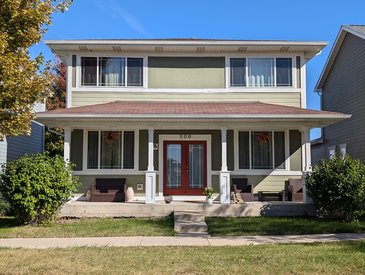 front view of a house with a yard