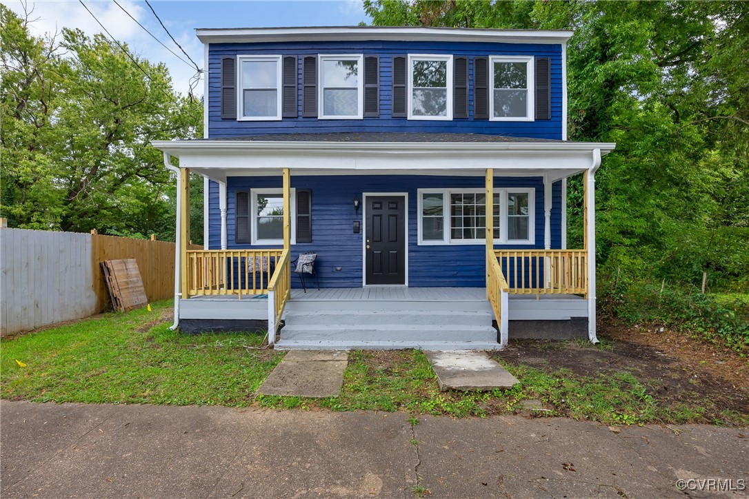 View of front of house with covered porch