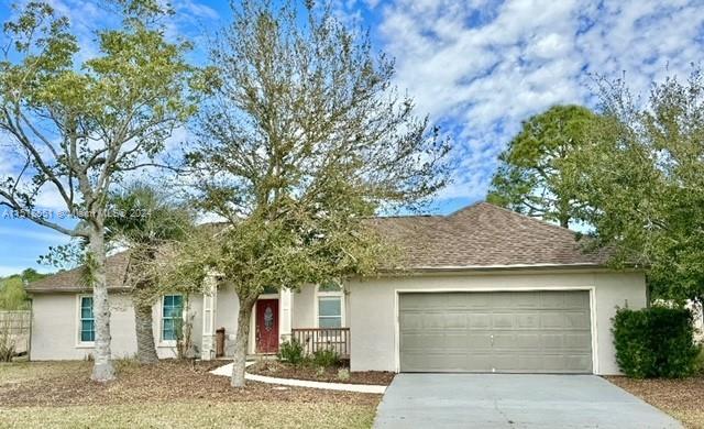 front view of house with a tree