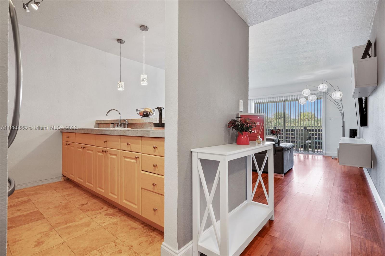 a very nice looking room with wooden floor