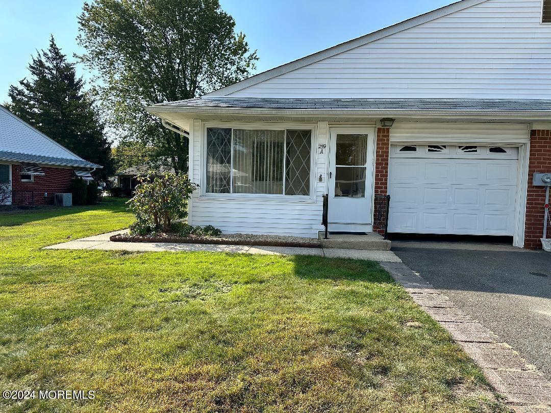 a front view of house with yard