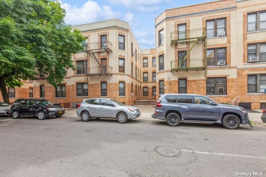 a cars parked in front of a building