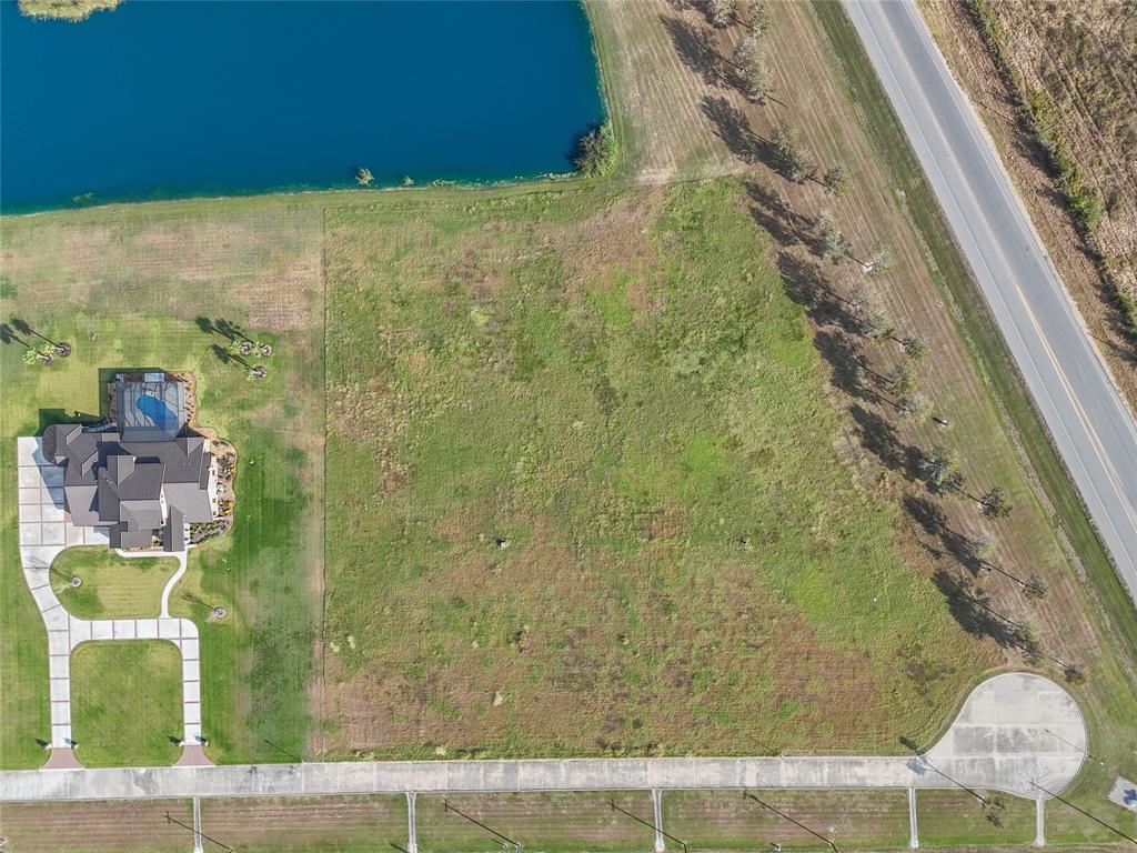 Access to the shared subdivision pond that is stocked with bass and features a pier.