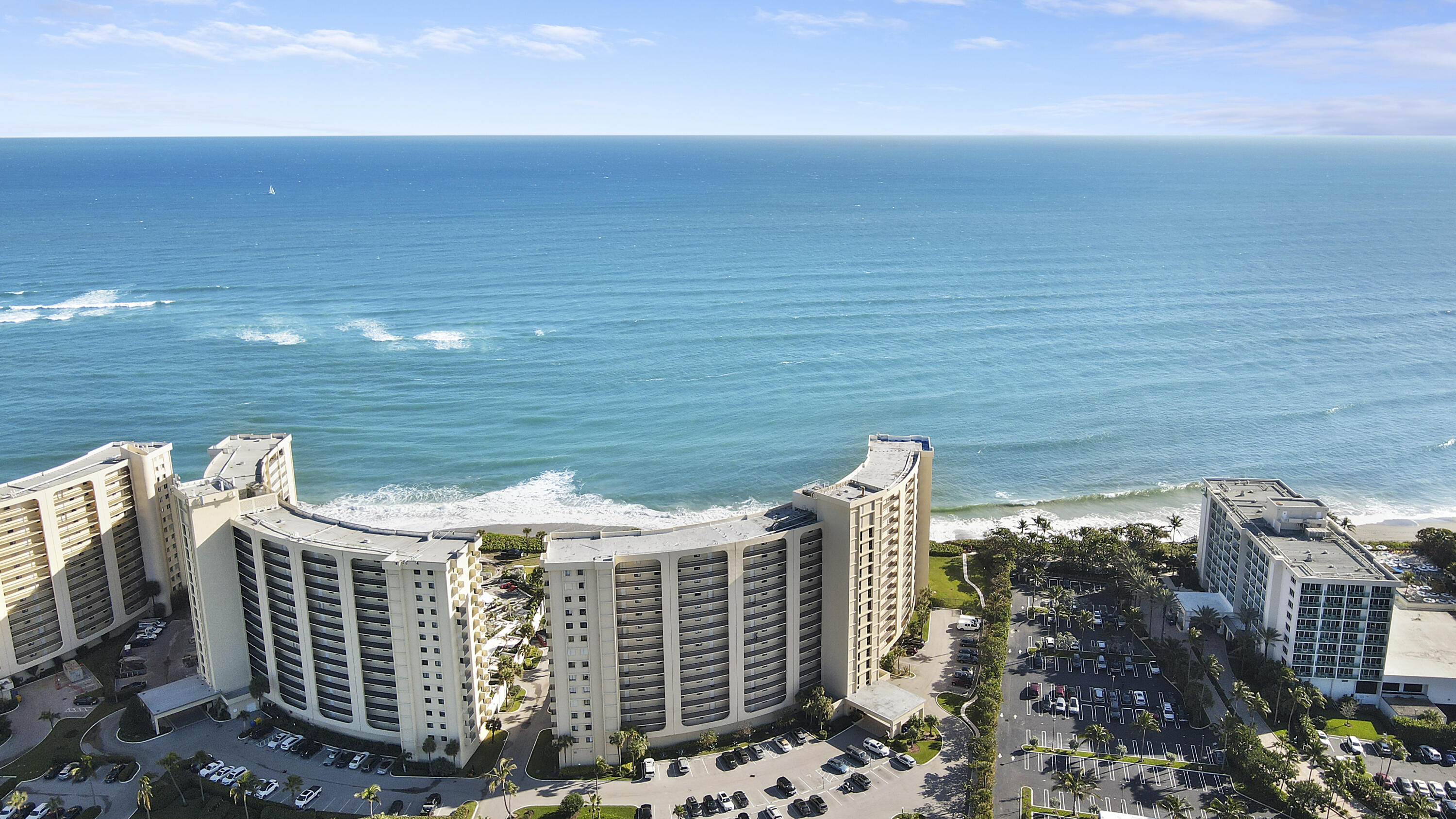 a view of a city with an ocean view