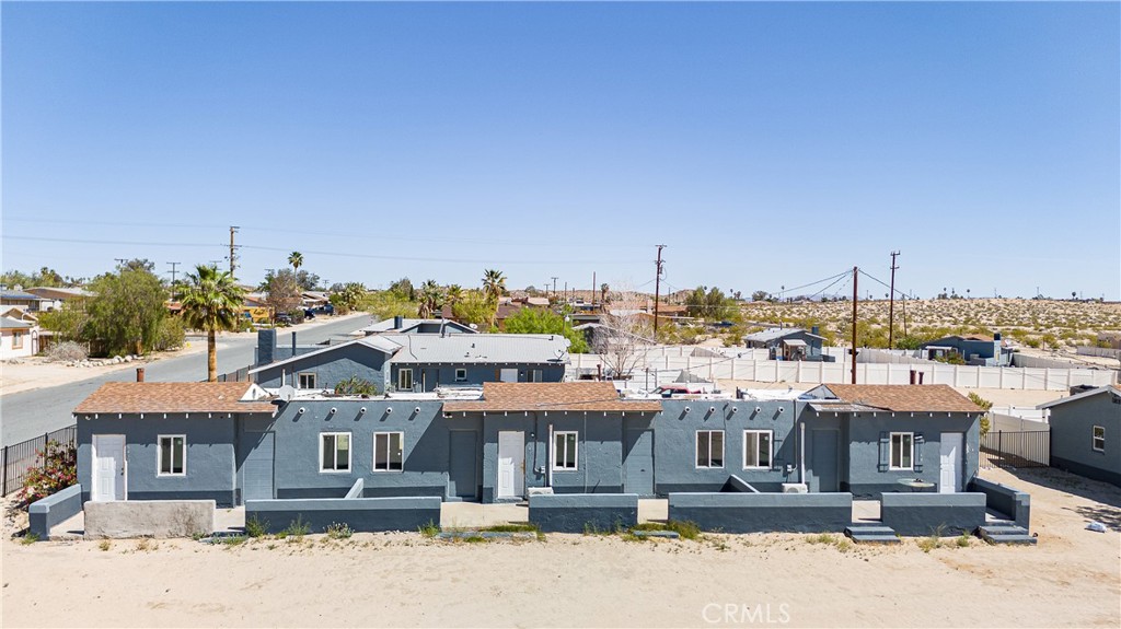 a view of a city and a big yard