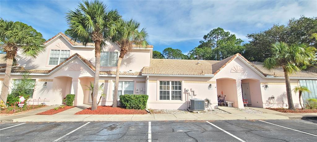 a front view of a house with a patio