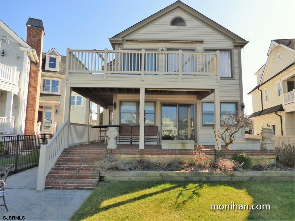 a front view of a house with swimming pool