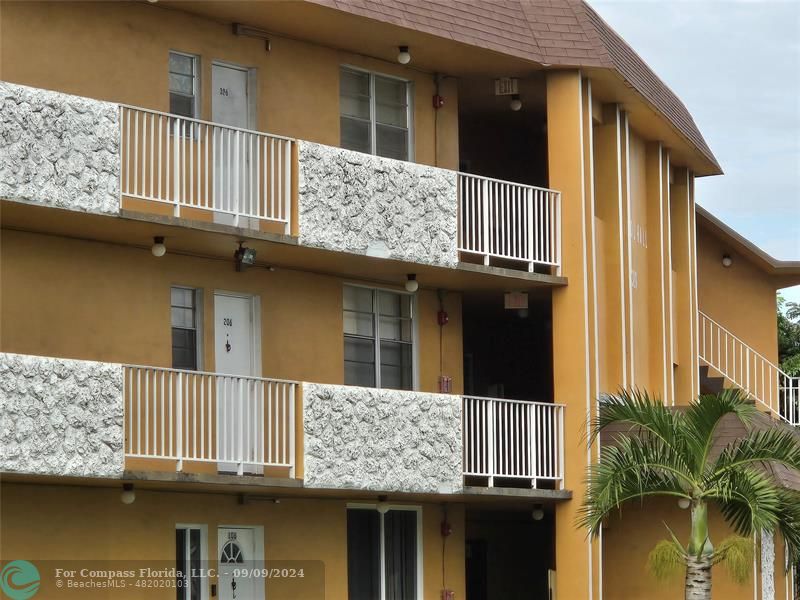 a front view of a house with balcony