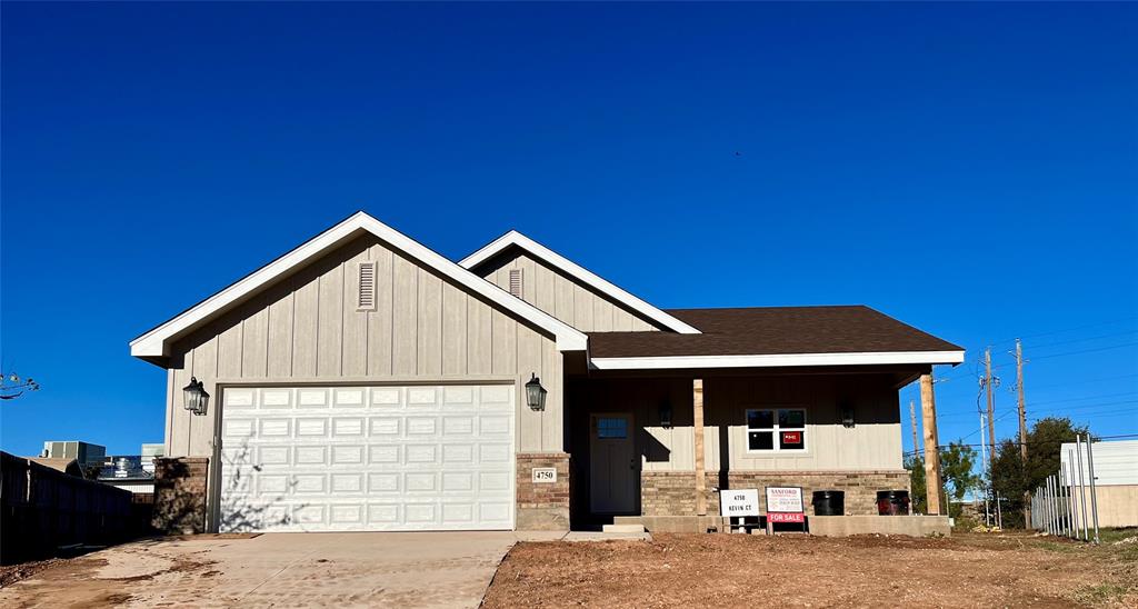 a front view of a house with a garage