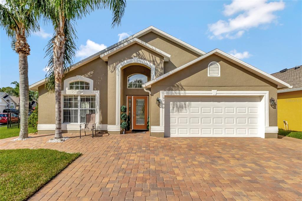 a front view of a house with a outdoor space