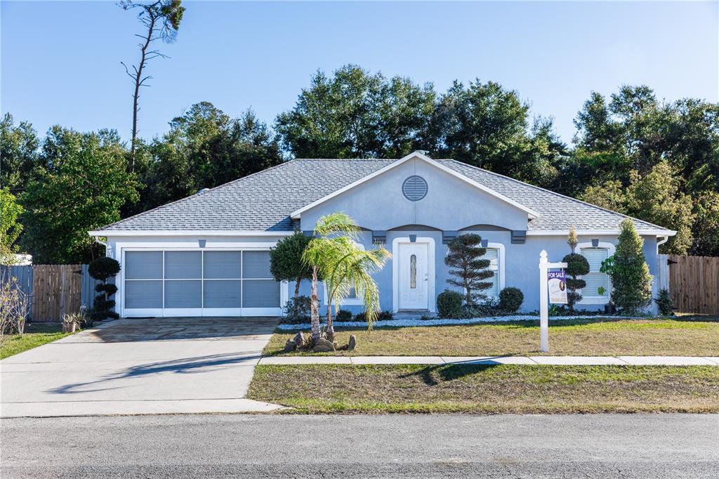 a front view of house with yard