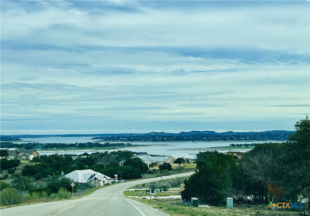 a view of a lake with a big yard