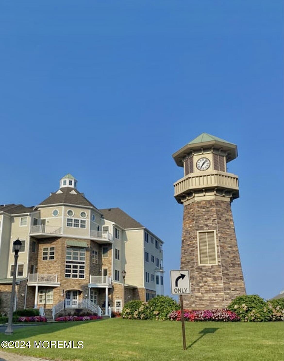 a front view of a building with garden