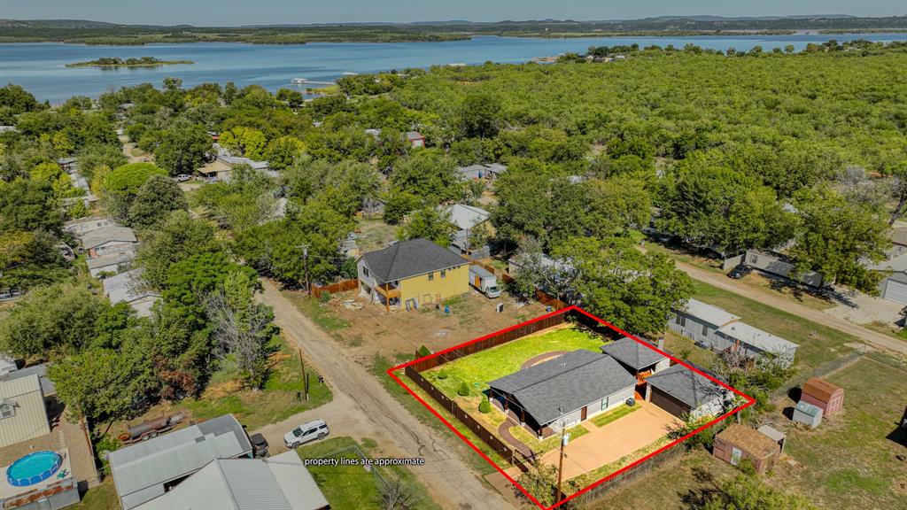 an aerial view of a house with a garden