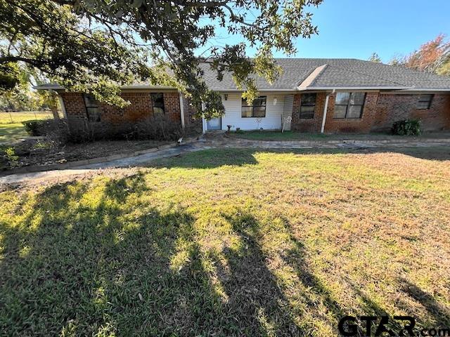 front view of house with a yard