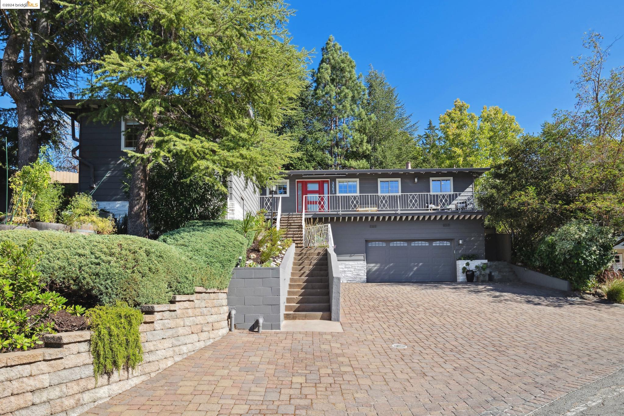 a house view with a garden space