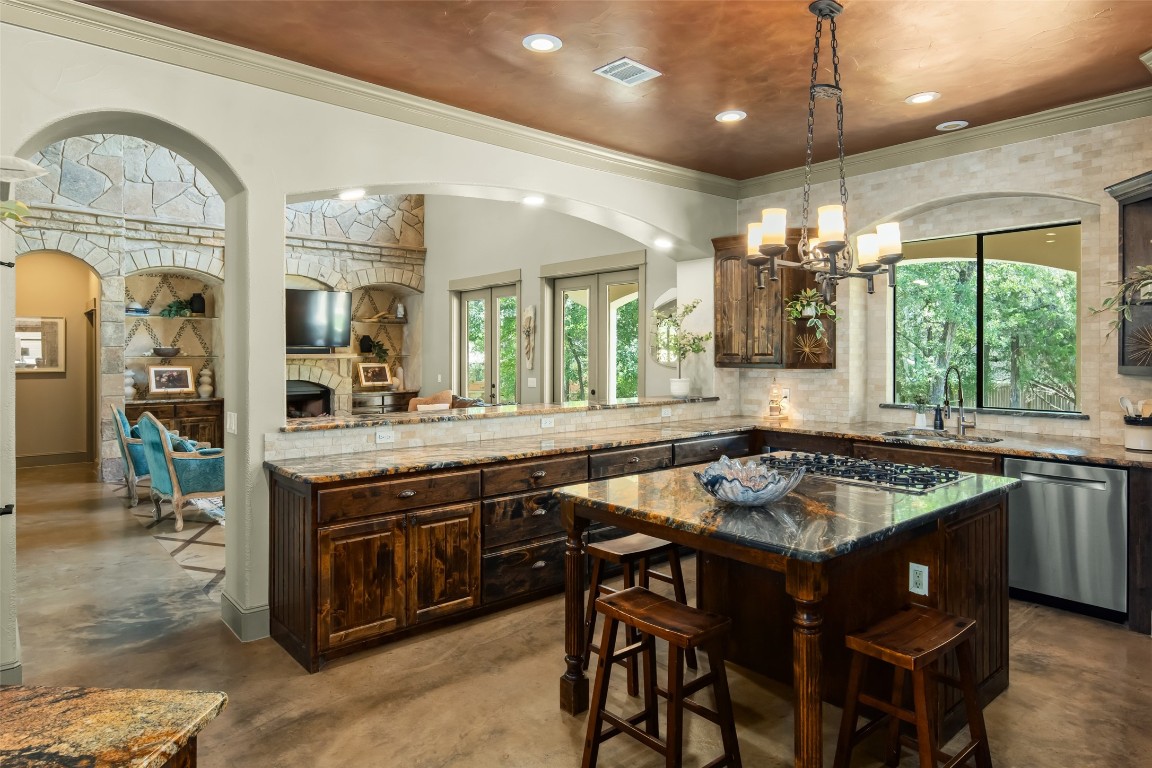 With abundant cabinetry and two pantries, there is no shortage of space in this deluxe kitchen.