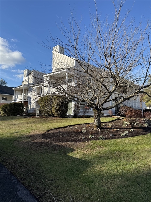 a view of a house with a big yard