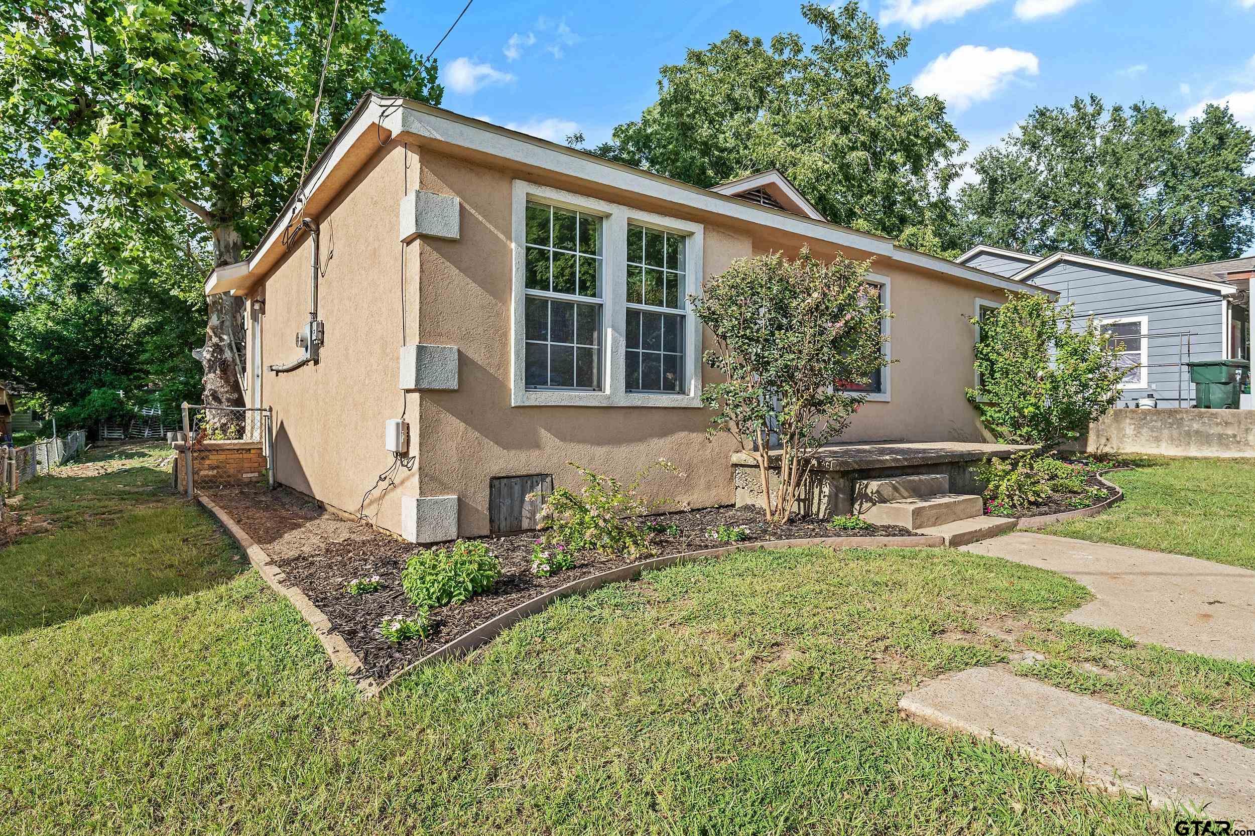 front view of house with a yard