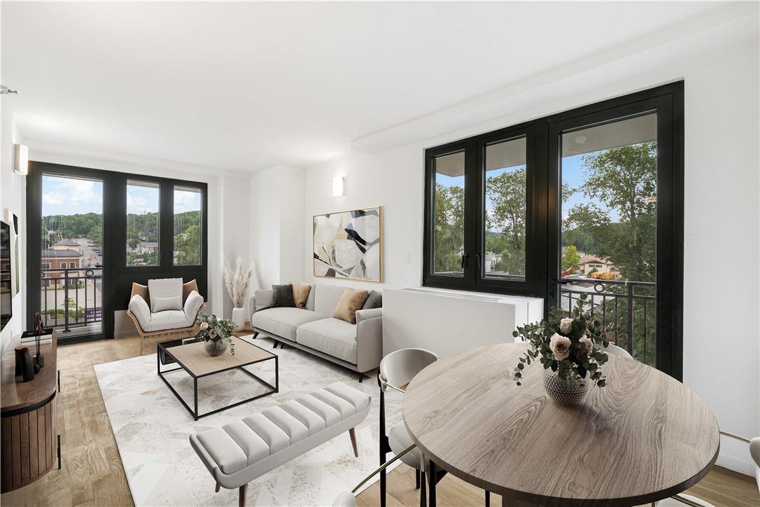 a living room with furniture and a table