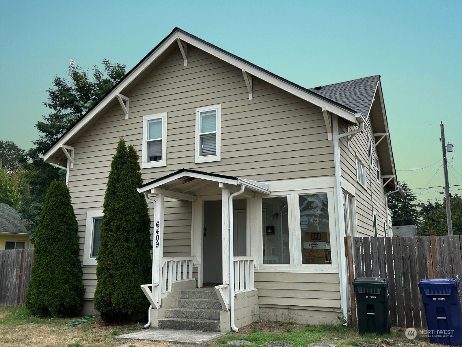 a front view of a house with a garage