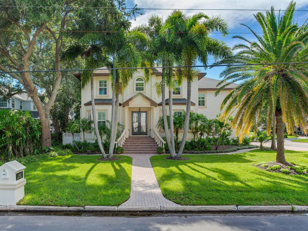 front view of a house with a yard