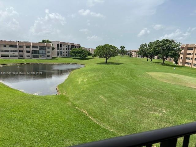 a view of a lake with a big yard