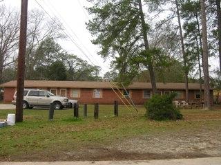 a view of a house with a garden