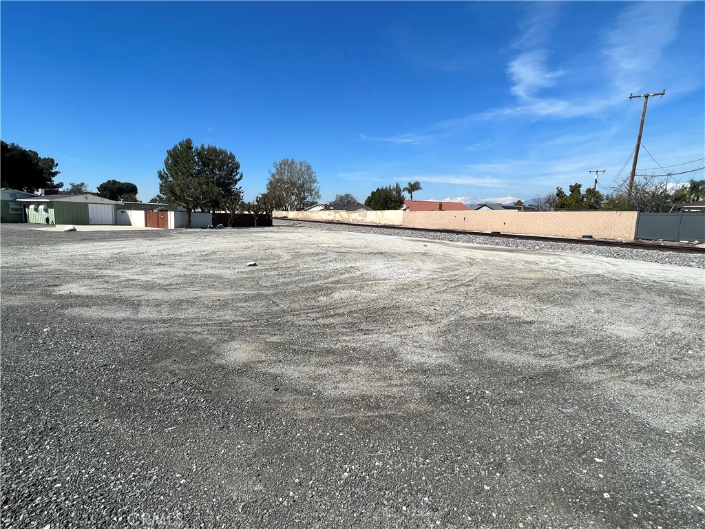 a view of a road with a building in the background