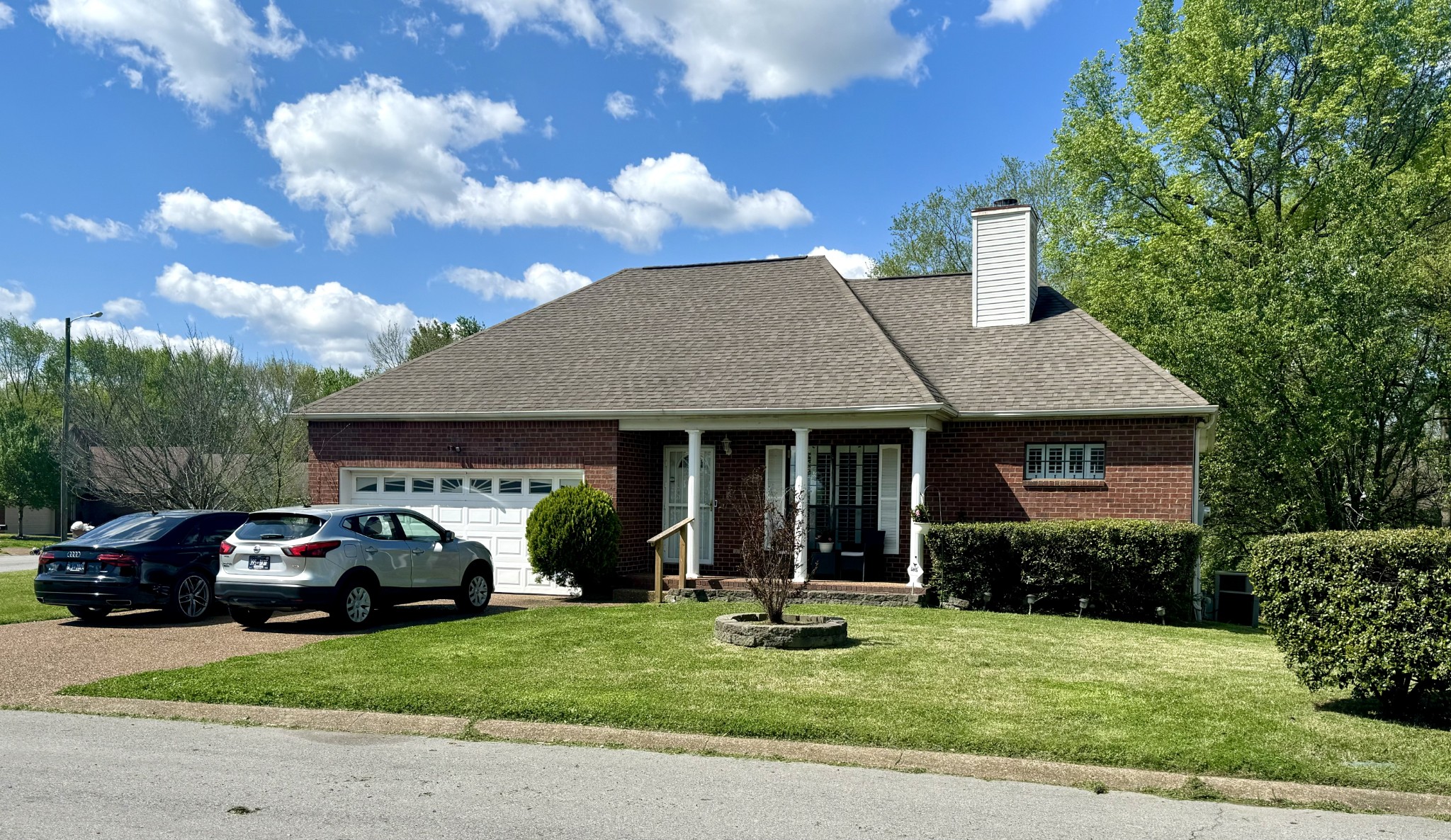 a view of car parked in front of house