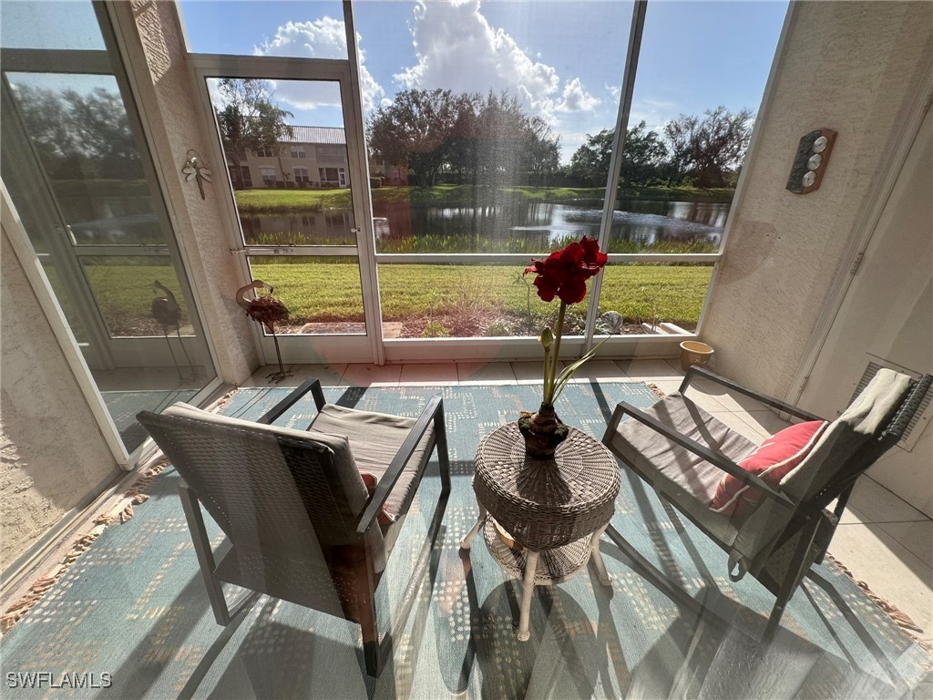 a view of an outdoor sitting area with furniture