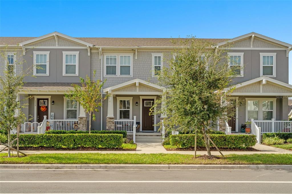 a front view of a house with a yard