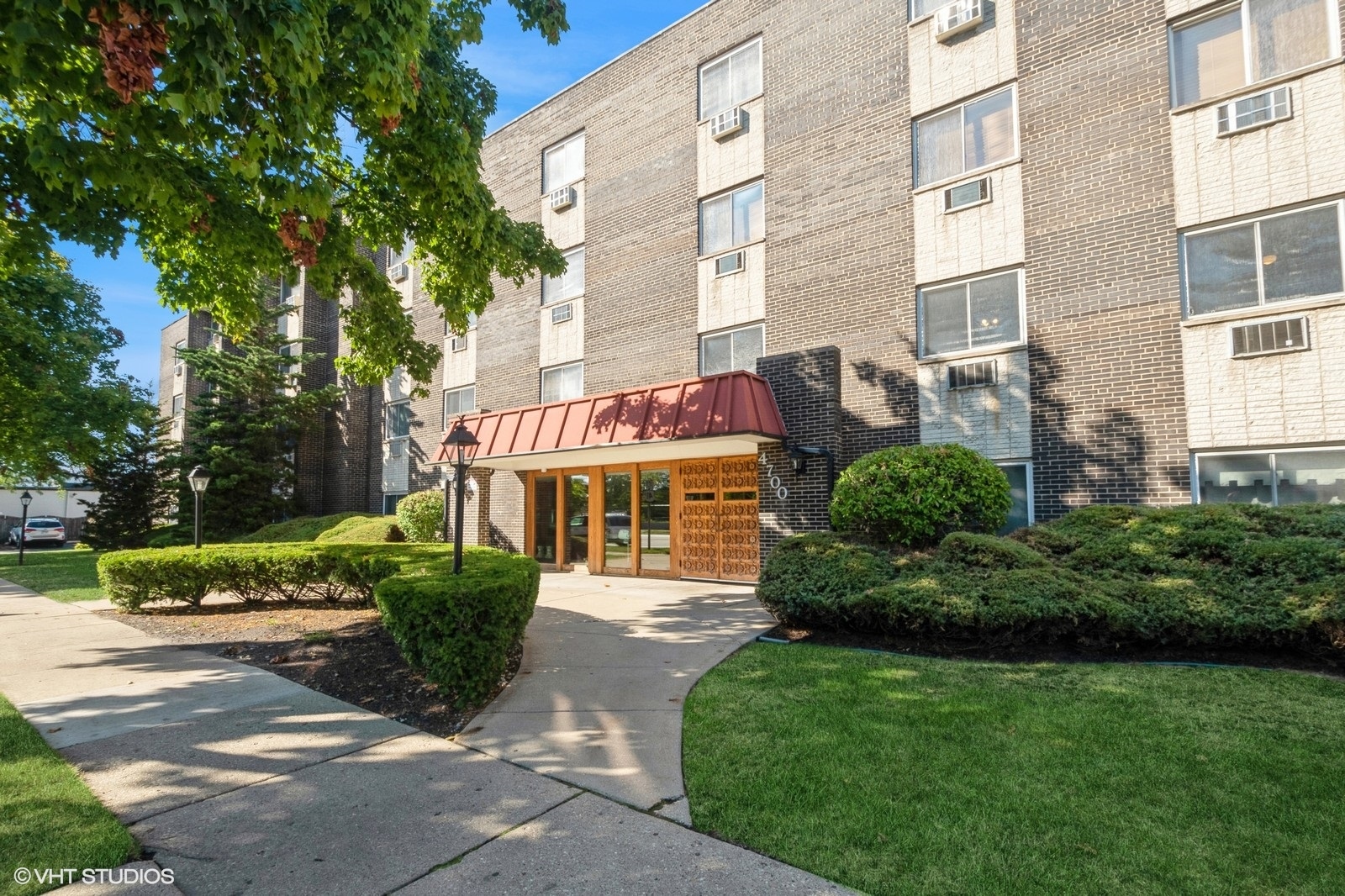 a front view of a multi story residential apartment buildings