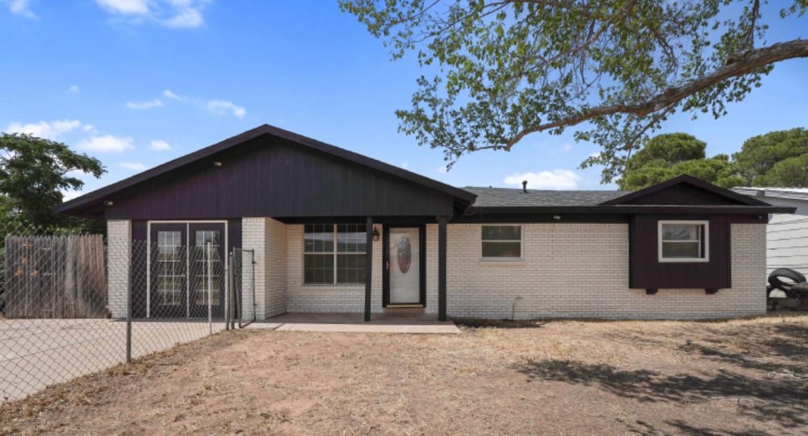 a front view of a house with a garage