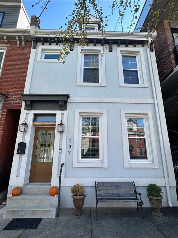 a front view of a house with windows