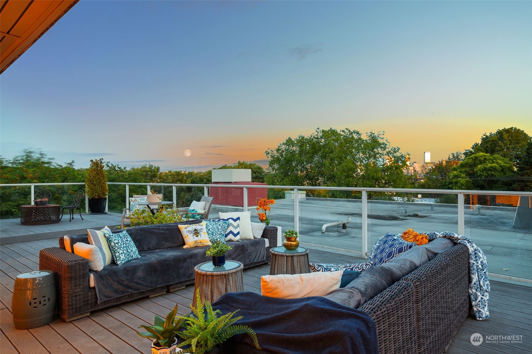 a outdoor living space with furniture and city view