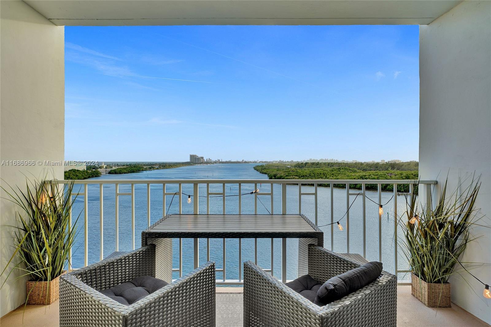 a view of a balcony with furniture