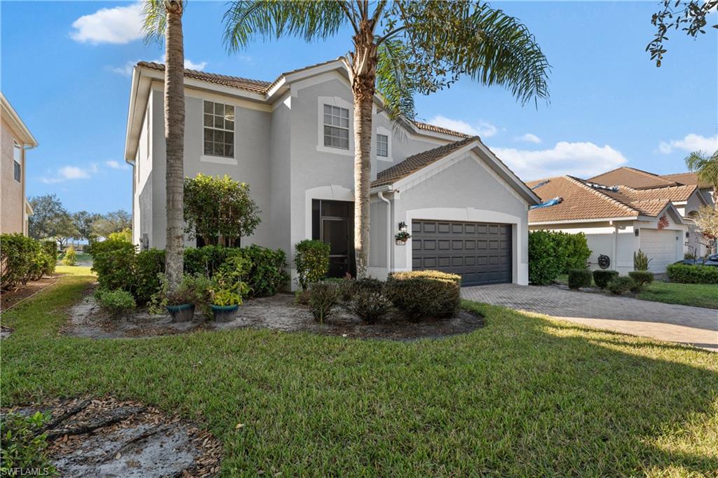 View of front of property featuring a front lawn