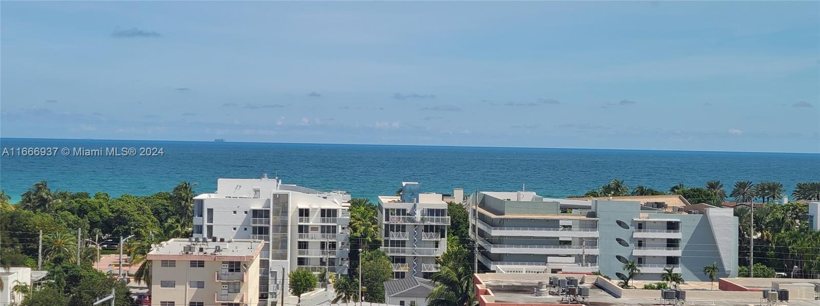 a view of city with tall buildings