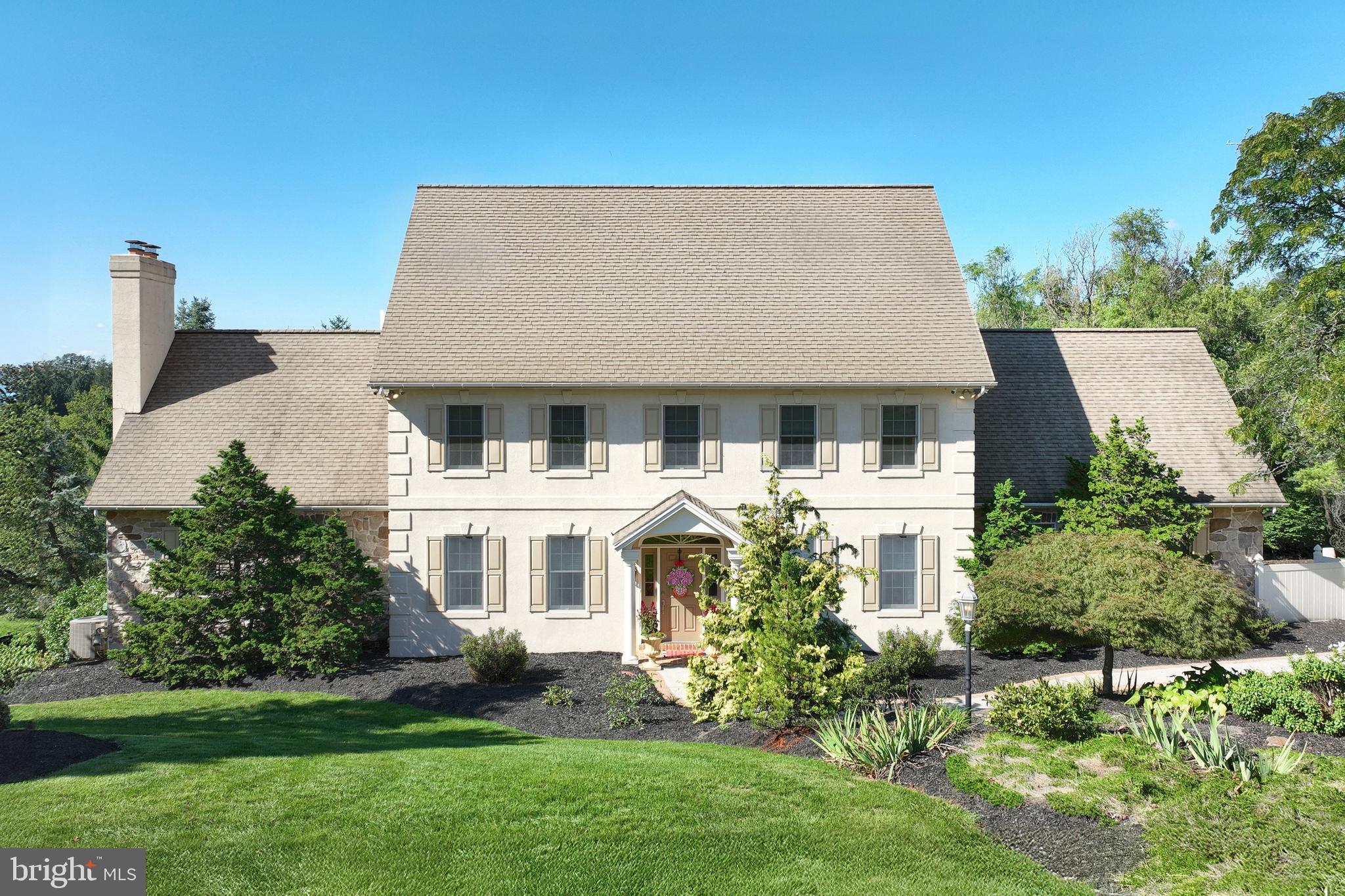 front view of house with a yard