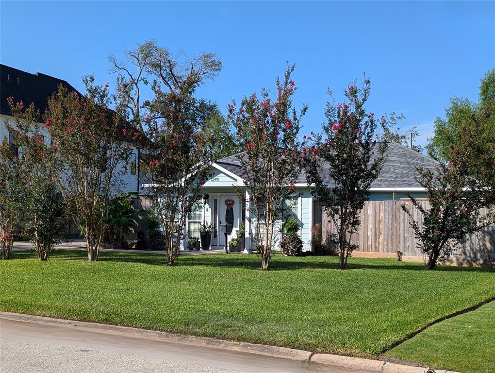 Welcome to 1249 Kinley Lane; a sweet cottage with whimsical character that welcomes the outdoors in. This home is pristinely kept. Totally rebuilt in early 2000's with full solar connections added in 2023, full water softening system in 2021, and completely finished garage / studio space. Move-in ready, or prime for a new-build to grace the 82' street frontage.