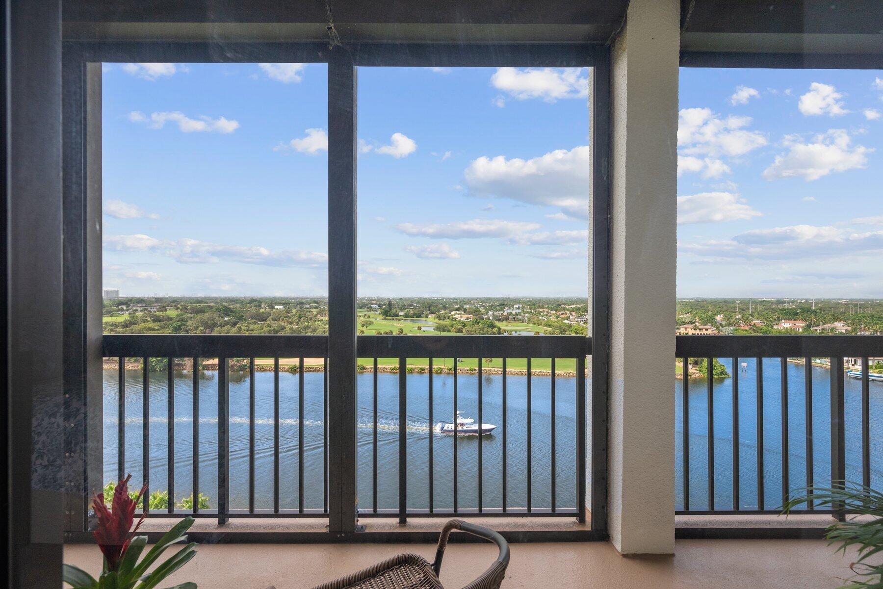 a view of a balcony with furniture