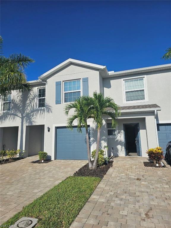 View of front of home featuring a garage