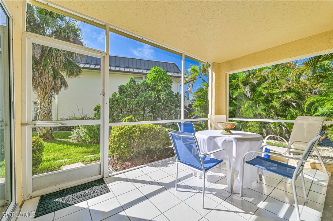 a view of a two chairs in the porch