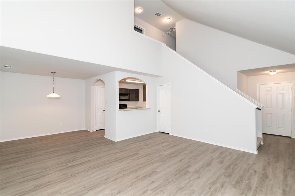 a view of a big room with wooden floor