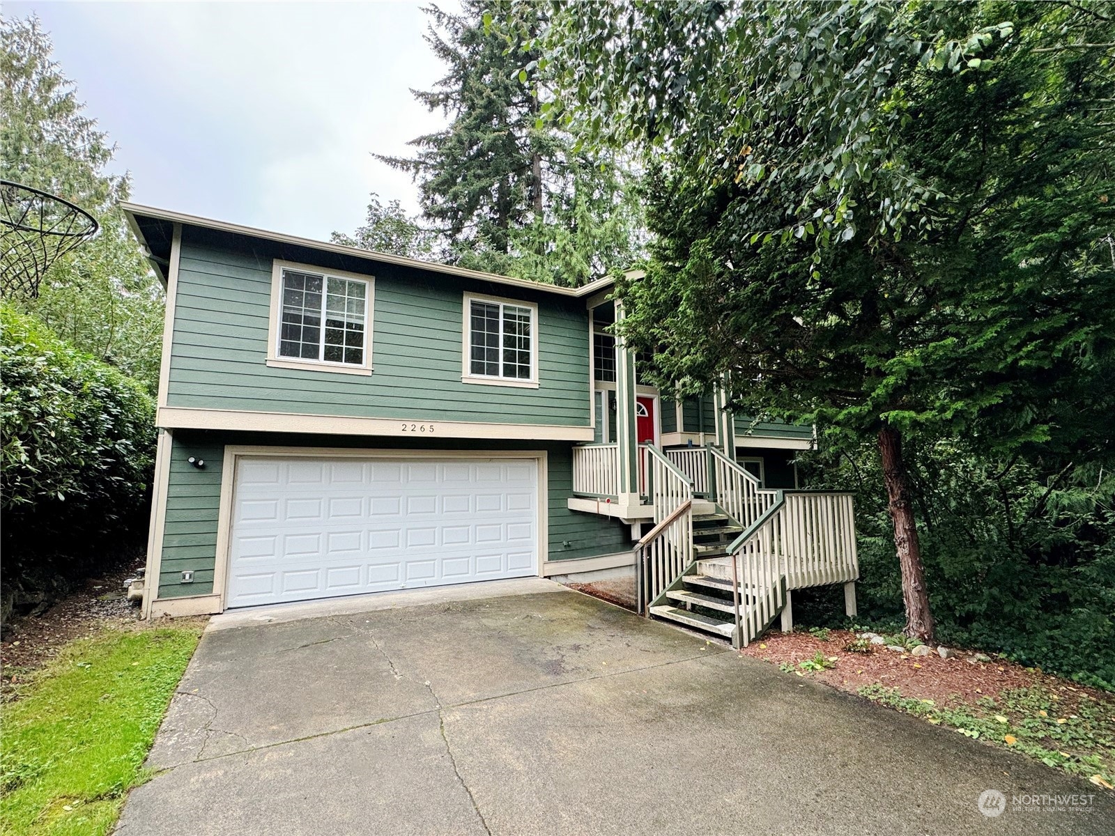 a view of backyard and deck