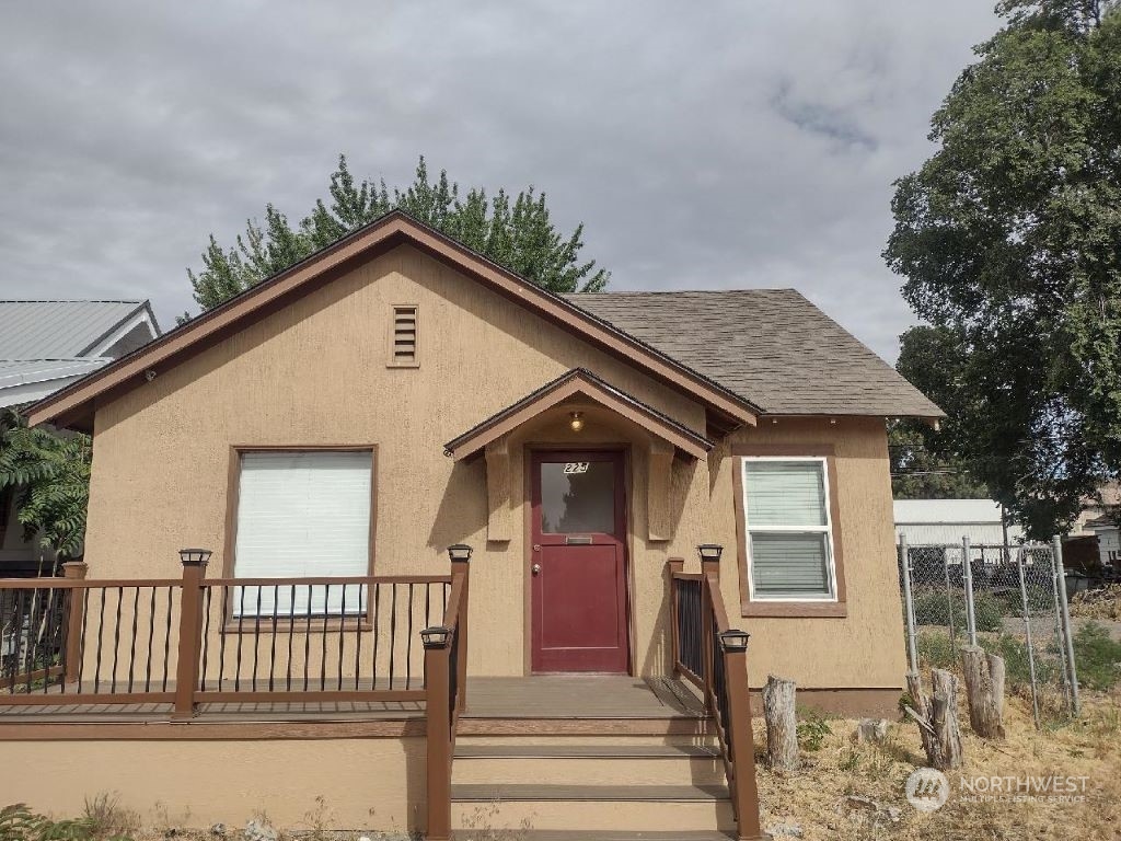 a front view of a house with a porch