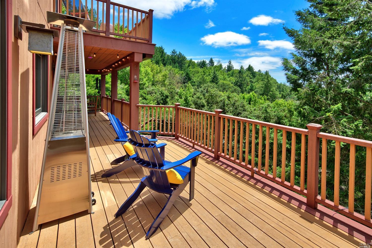 a view of a balcony with chairs