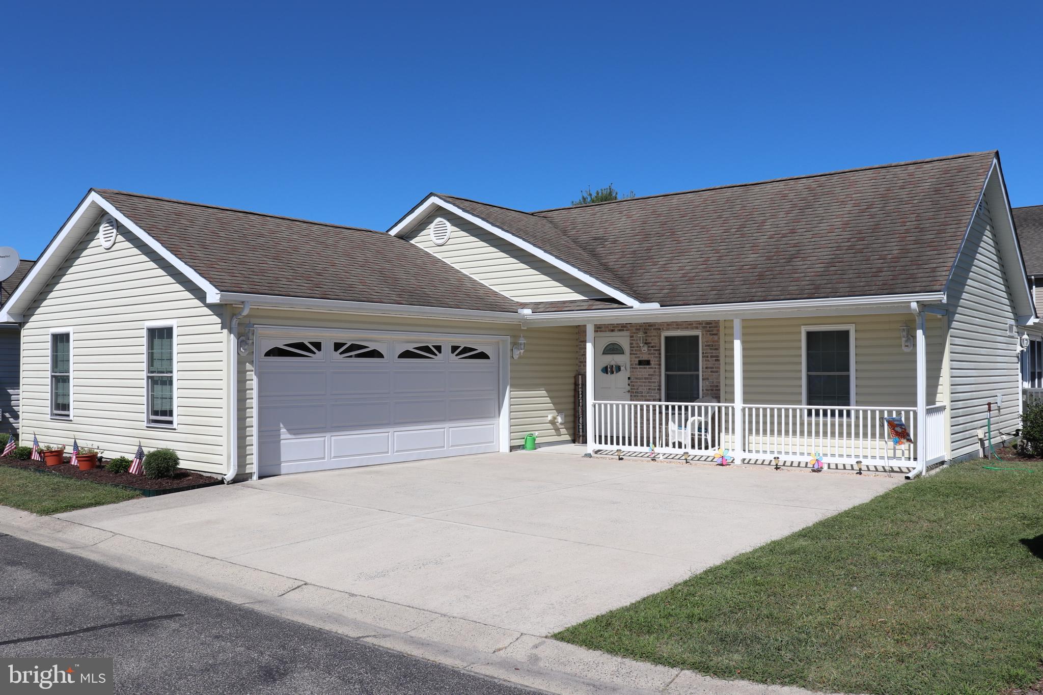 a house with yard in front of it